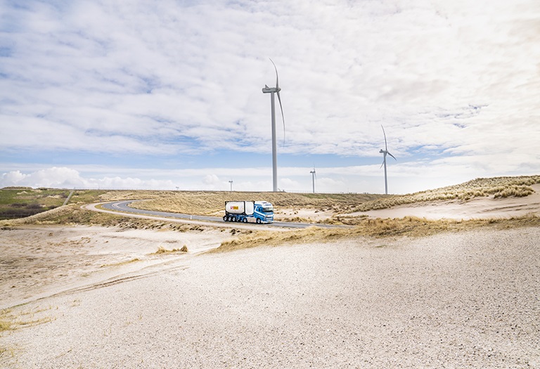 Tank Container Truck Driving Windmills