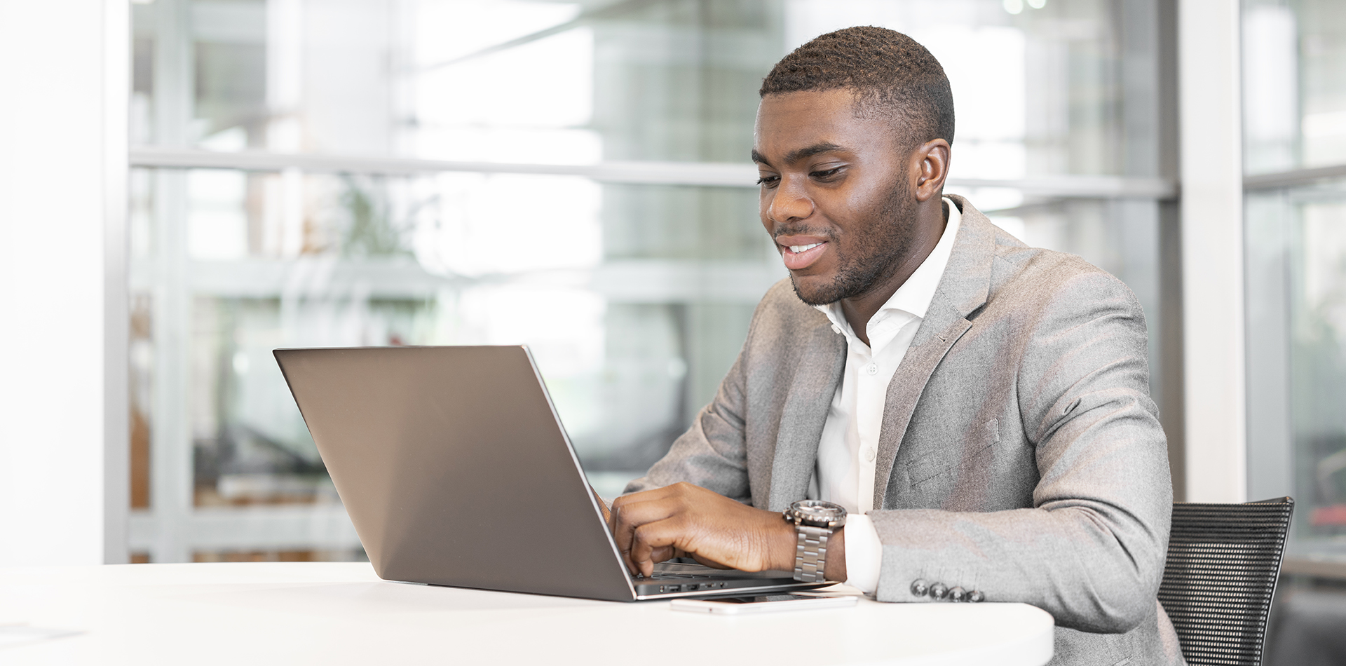 Operations coordinator working on a computer