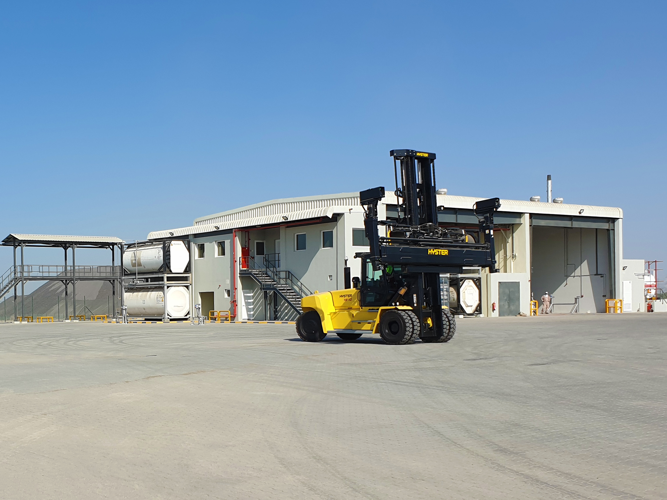 Tank Container carrier driving at the Stolt Oman depot